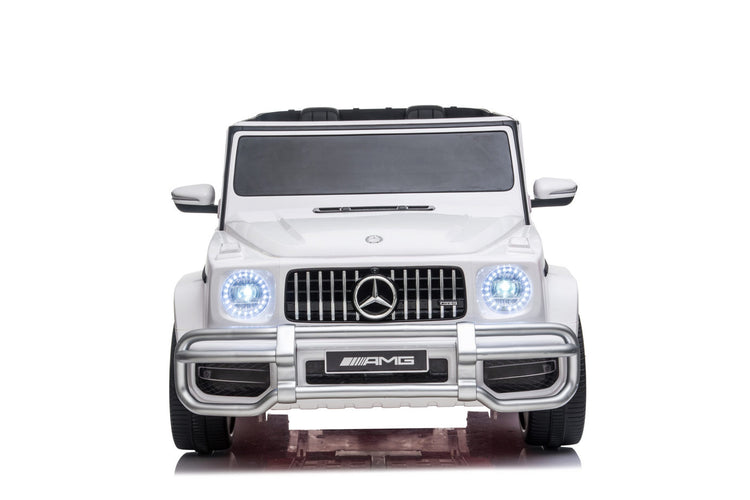 white 2 seater electric car with 2 seats amg