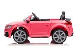 Kids ride one electric car in Pink