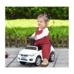 Child Riding White BMW Toddler Car